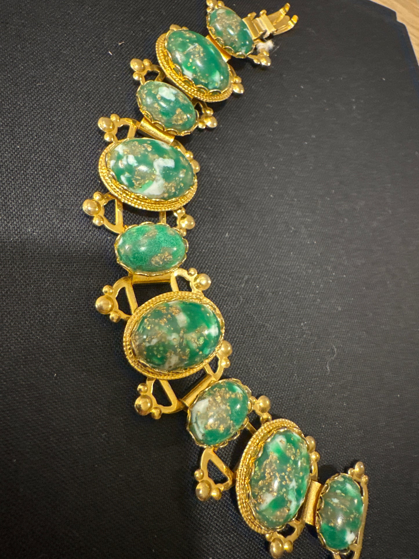 Beautiful 1960s green with gold flex stone bracelet with European mechanical hinges. jackpot