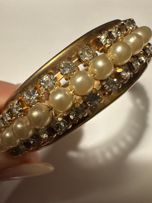 Beautiful 1950s pearl and rhinestone clamper bracelet.