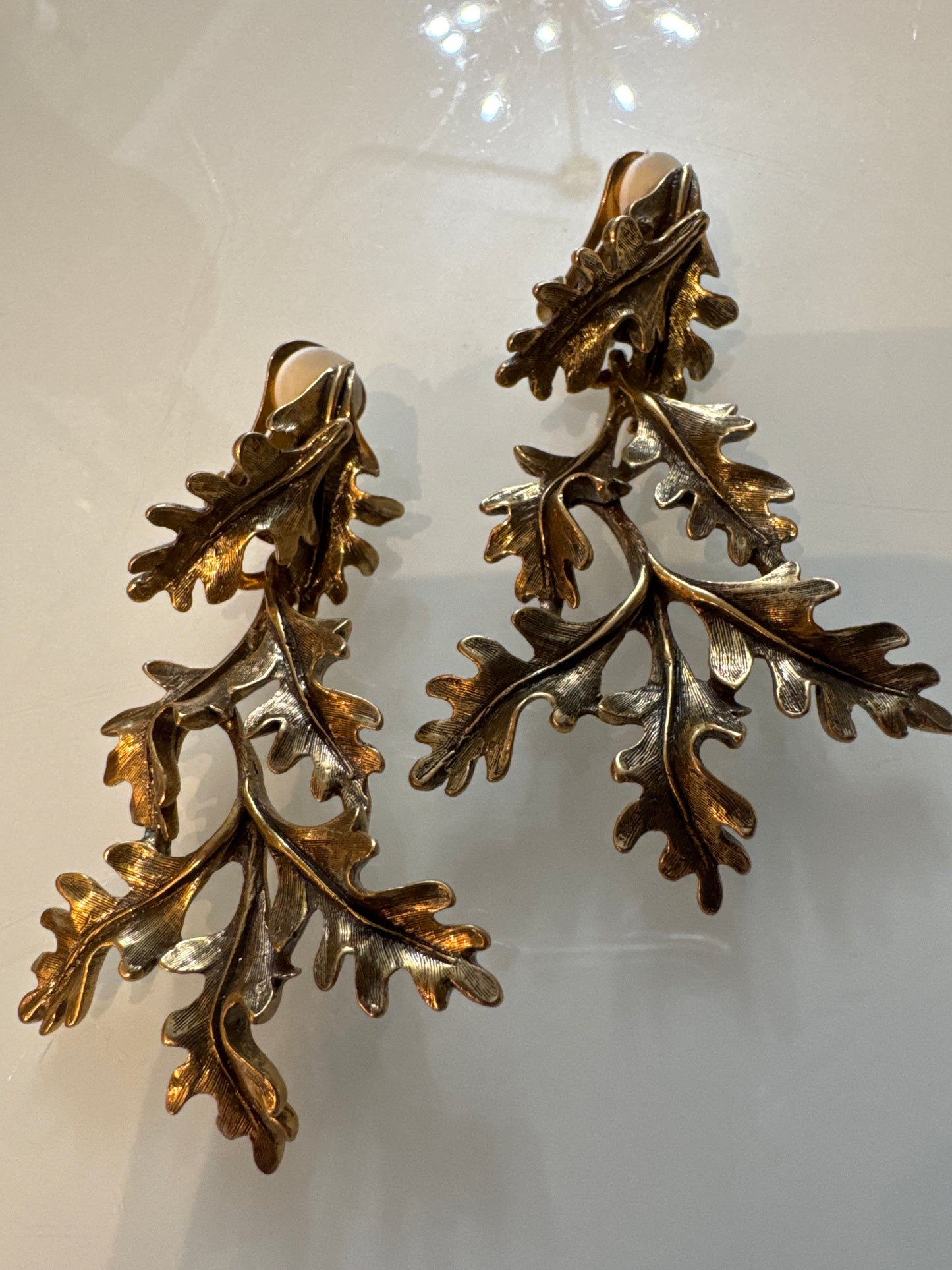 Oscar de la Renta brass tone dangle clip earrings. NYC