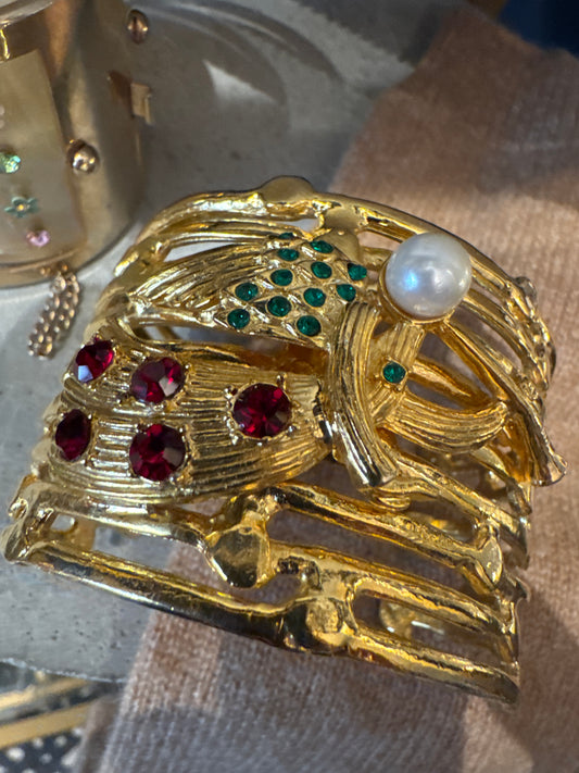 1980s vintage cherub gold tone cuff bracelet with rhinestones and faux pearl