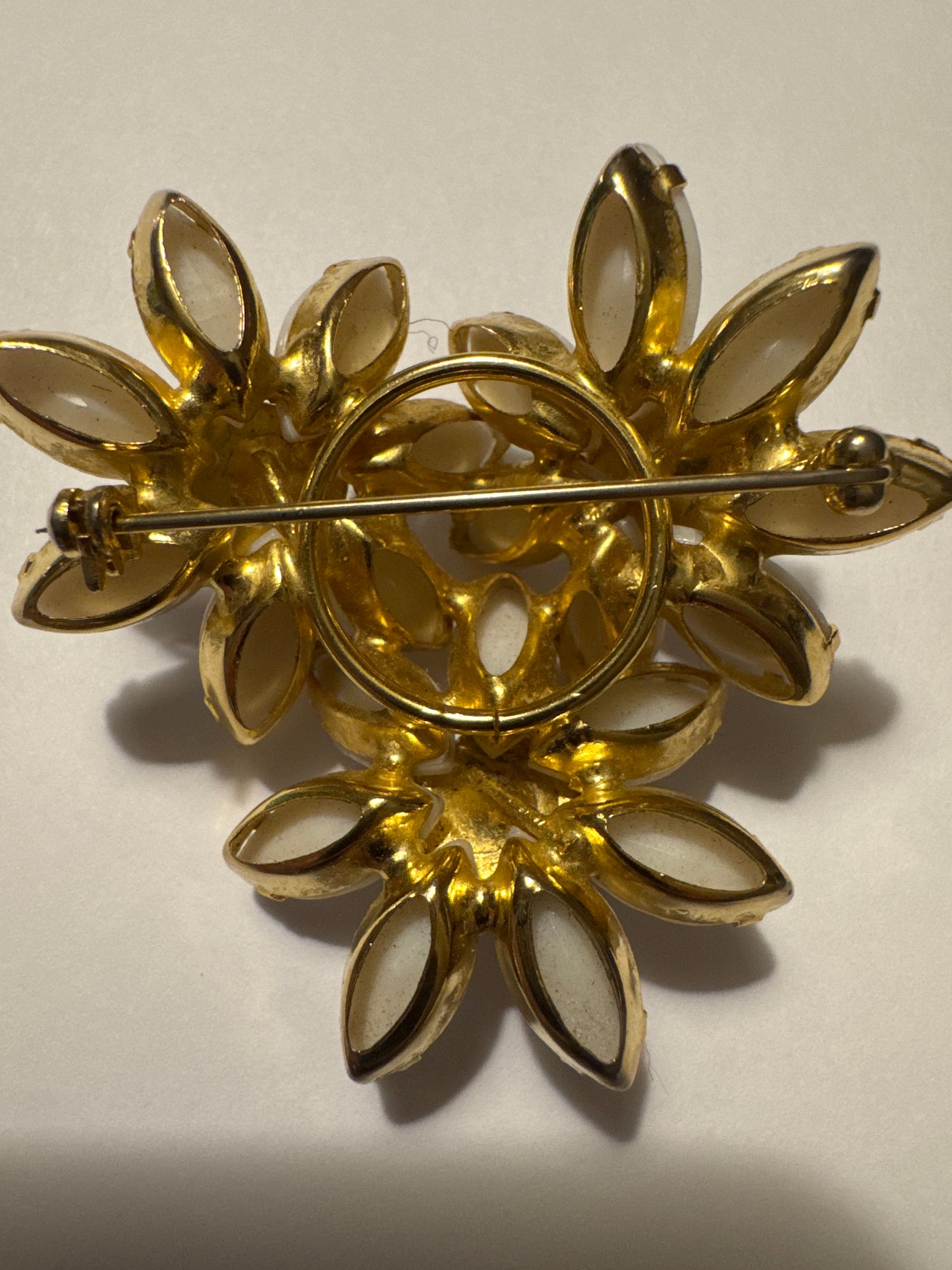 Juliana milk glass navette and black cabochon dome brooch. Road