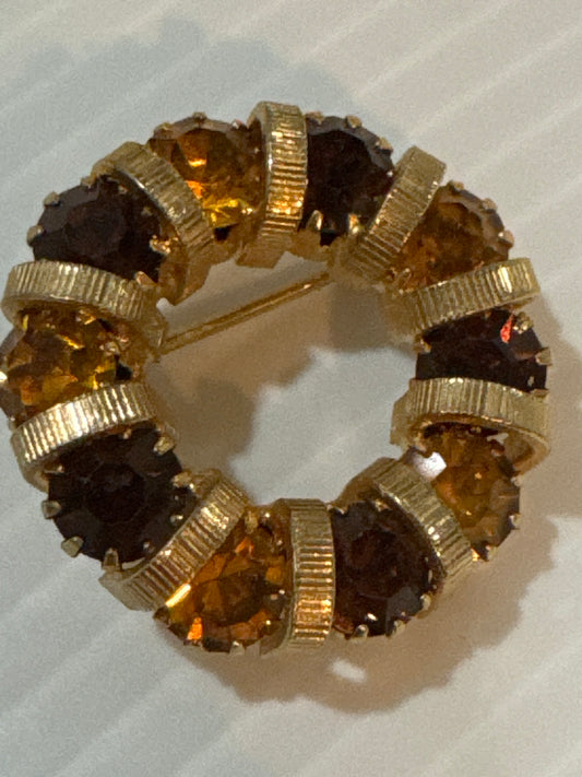adorable, mini shades of Amber colored circular brooch