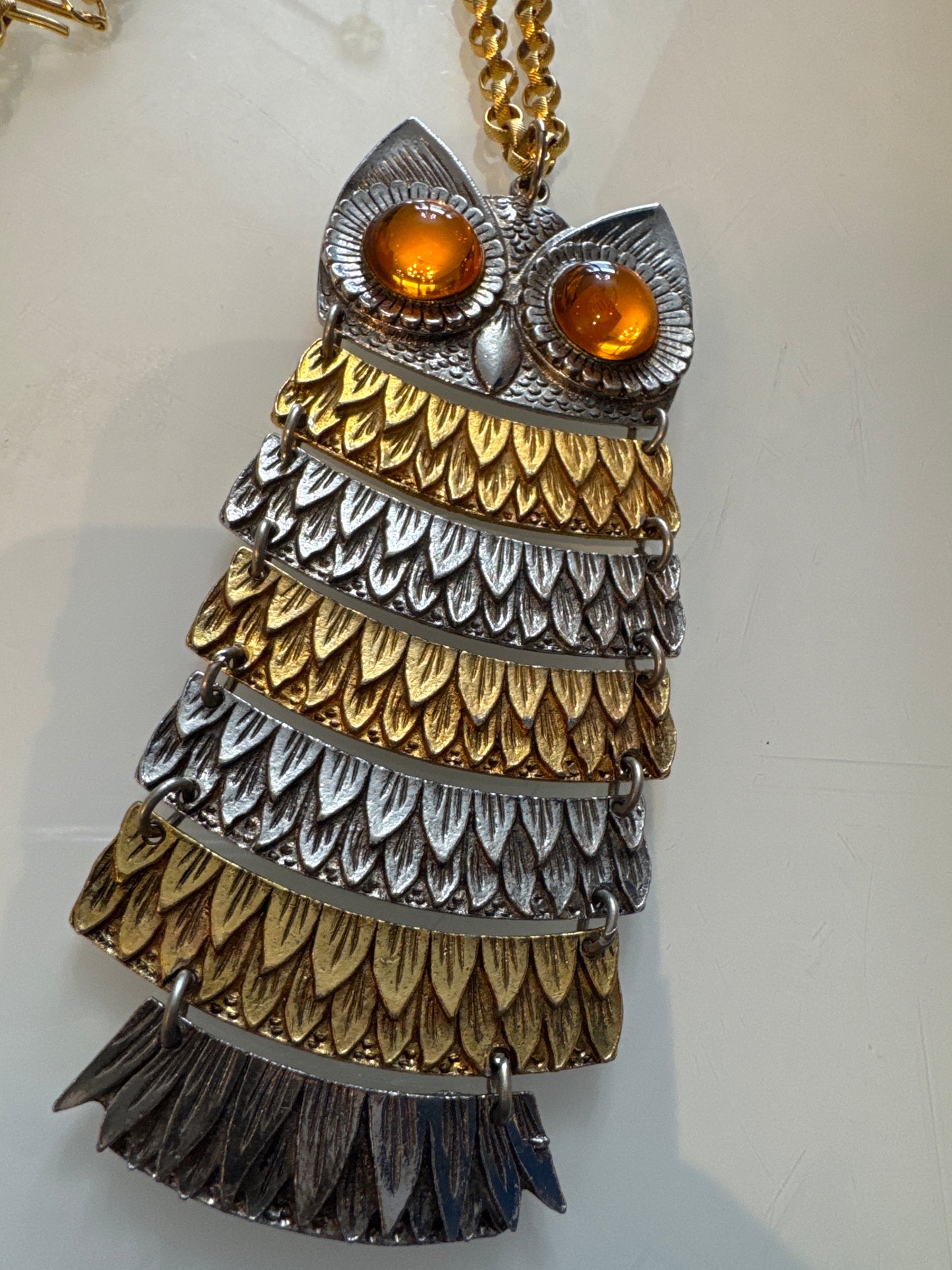 Vintage signed Park Lane ￼ articulated owl pendant necklace from the 1970s in gold and silver with cabachon amber eyes