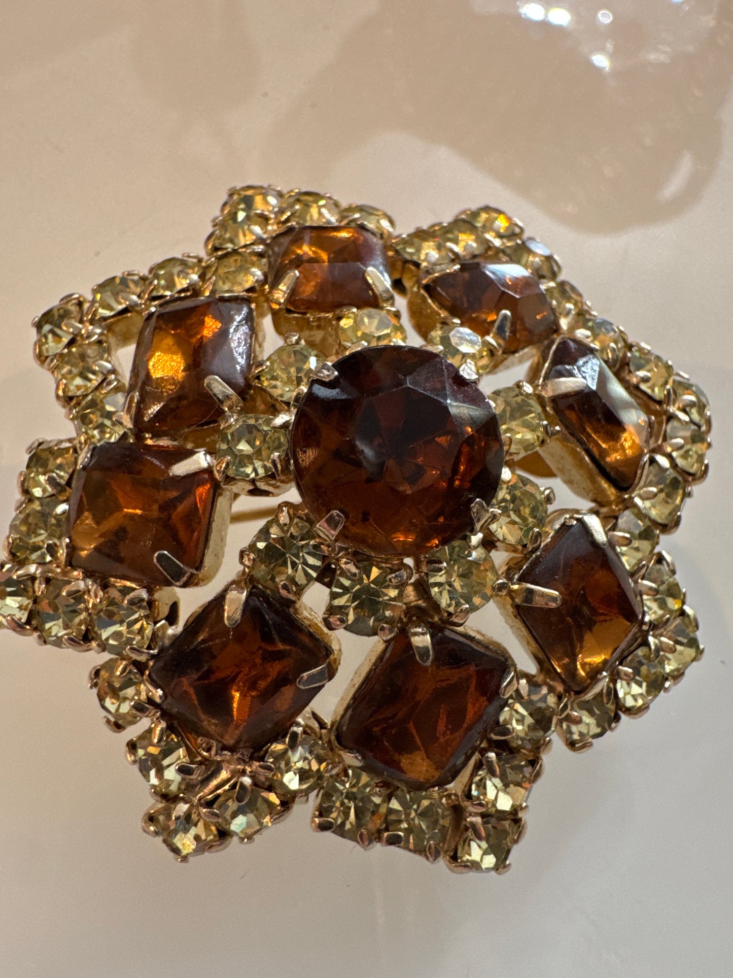Beautiful 1950s root beer and champagne colored rhinestone flower brooch