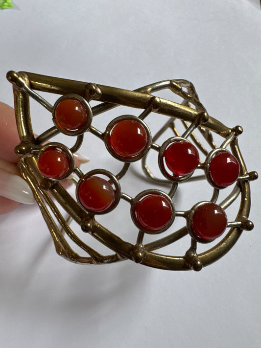1970s vintage brass with carnelian stone cuff bracelet. 3 inches wide.