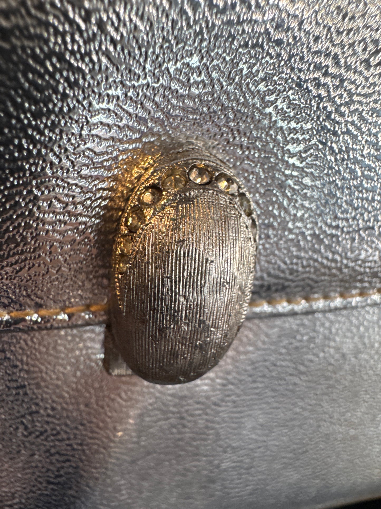 Adorable 1950s silver top handle bag with rhinestone clasp