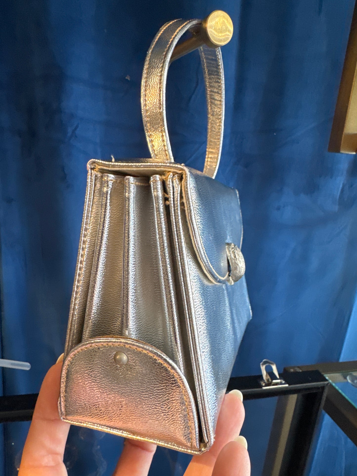 Adorable 1950s silver top handle bag with rhinestone clasp