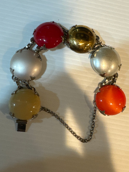 1960s button bracelet in Silvertone with safety latch