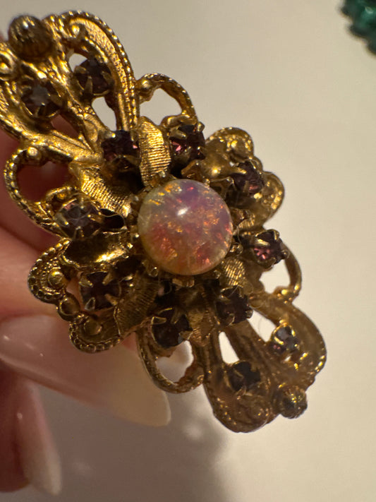 fun 1960s cocktail ring with pink confetti Centerstone. Road