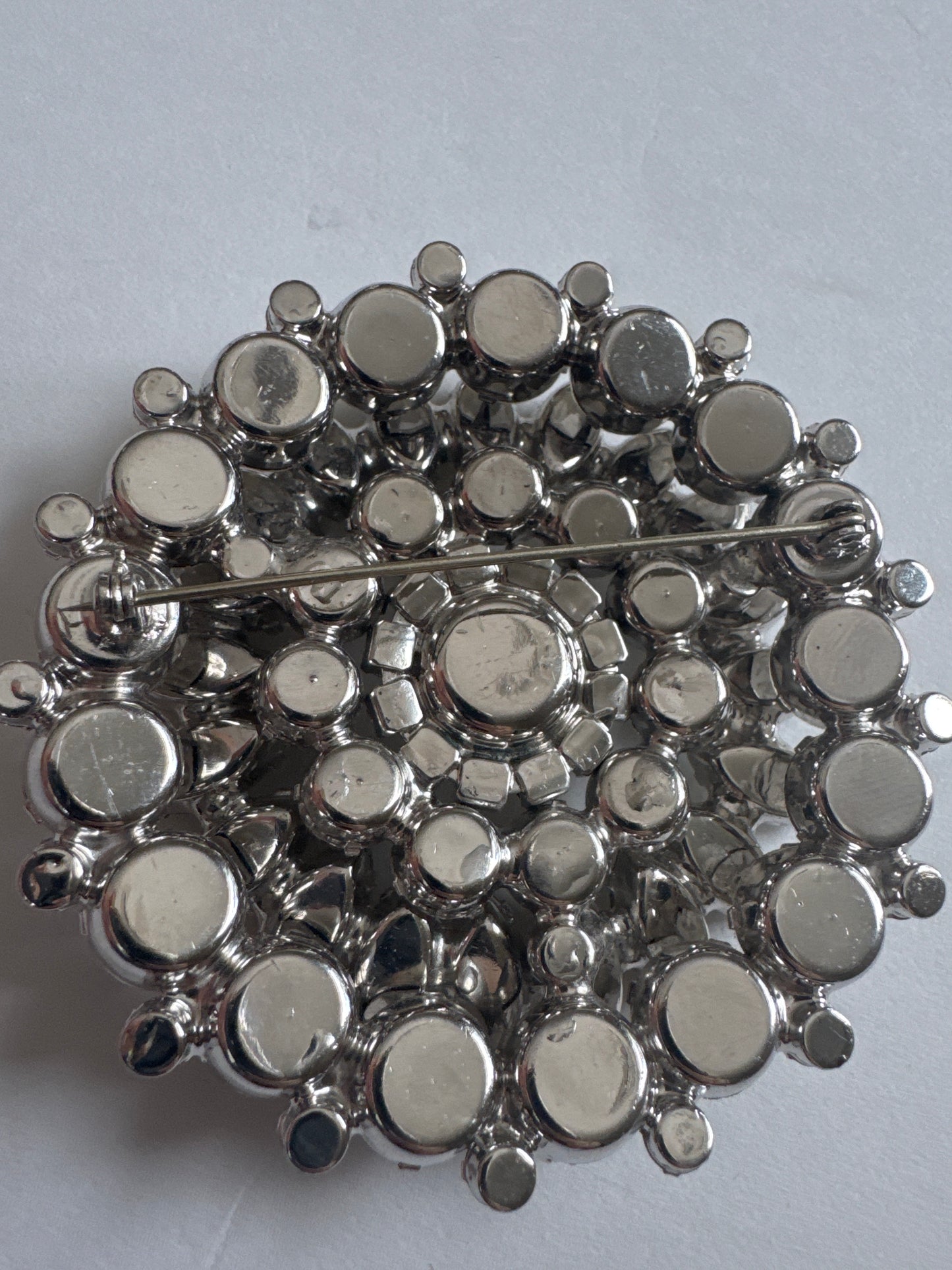 1950s gorgeous, sparkling, multi layered round rhinestone, unsigned brooch