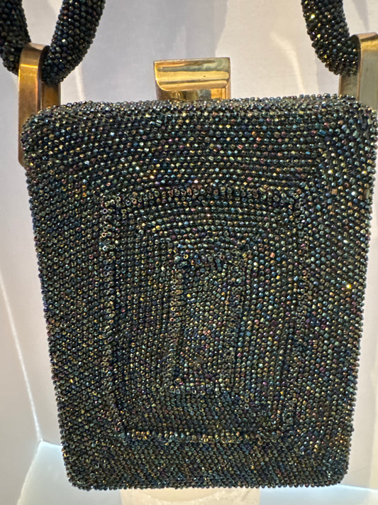 gorgeous 1940s beaded bag with dark green blue and bronze beading. Extra thick handle in mint condition.