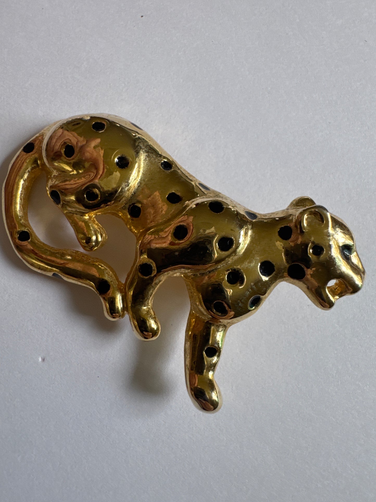 1980s gold tone with black enamel, cheetah brooch