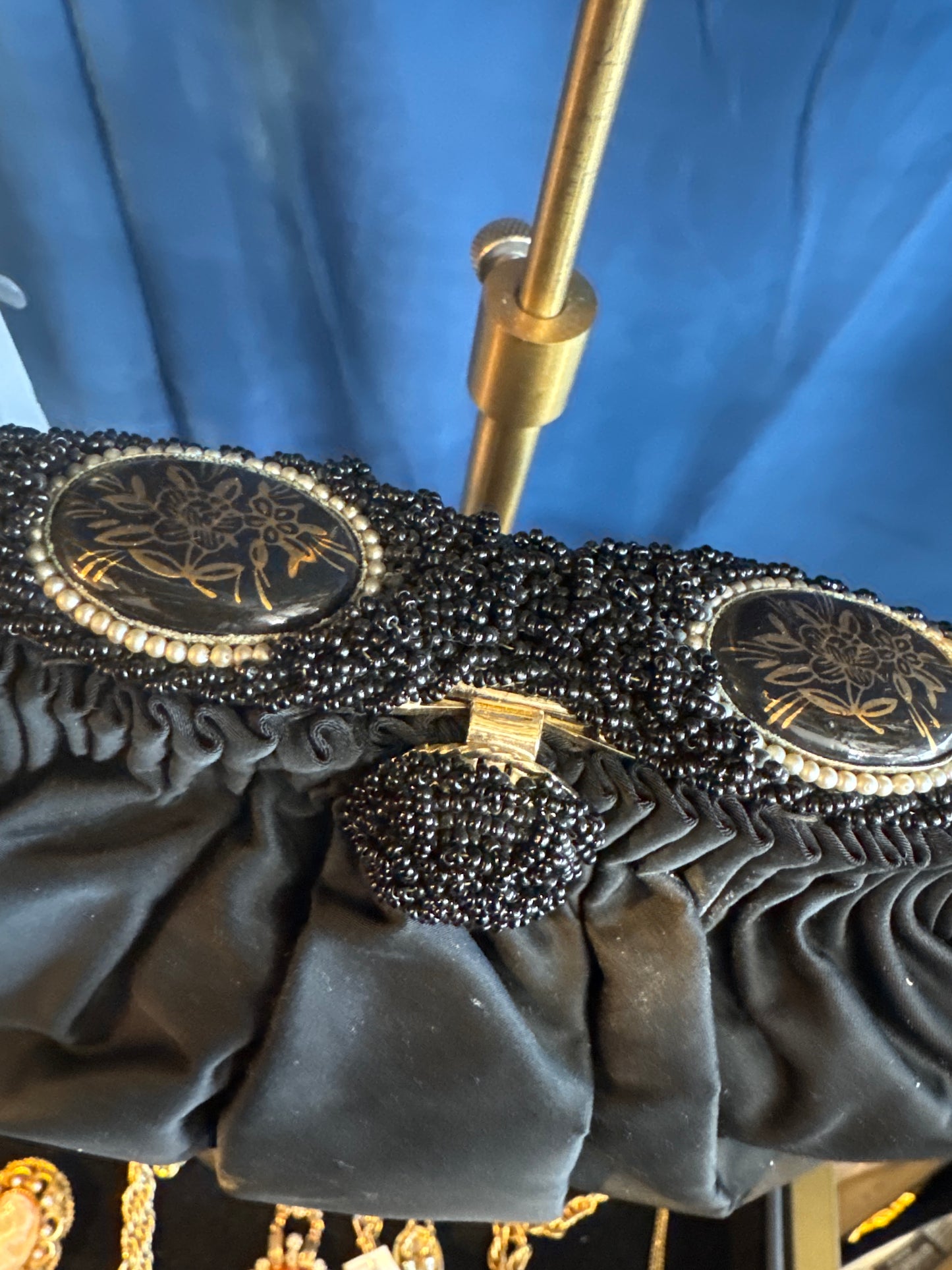 Beautiful 1930s satin black opera bag, with delicate chain and beautiful black beading and flower cameo detail at closure