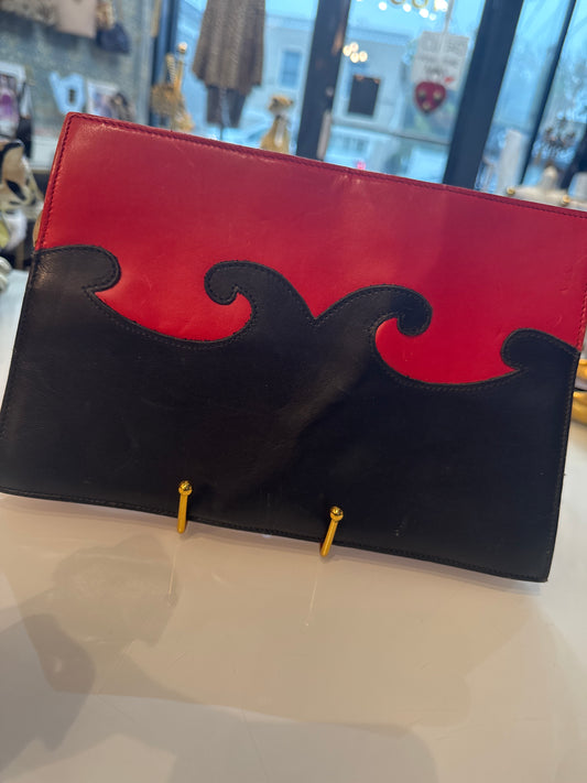 stunning vintage 1980s buttery leather CHRISTIAN LACROIX clutch bag in red and black with jewel zipper pull