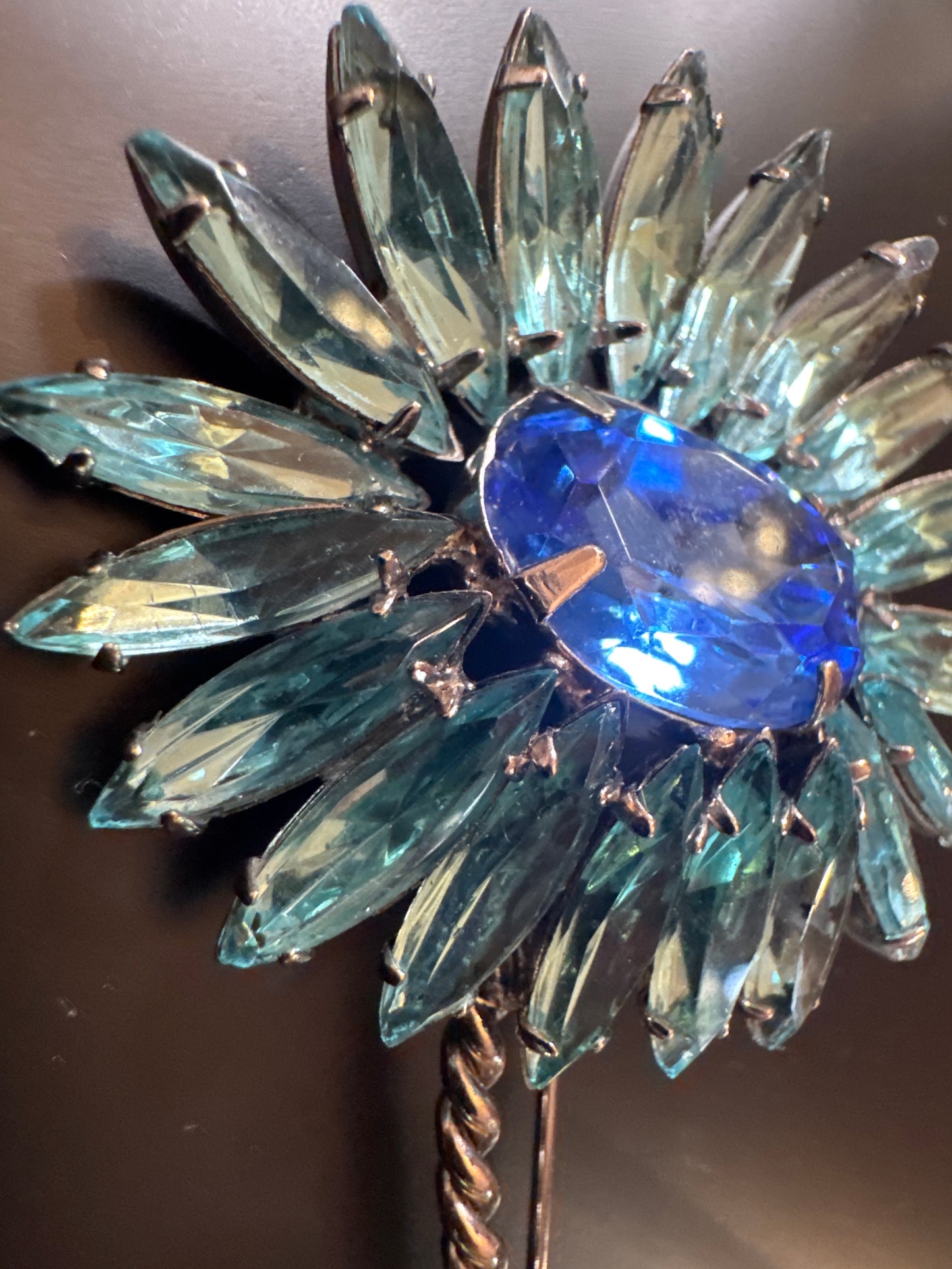 Stunning flower brooch with blue and green rhinestones