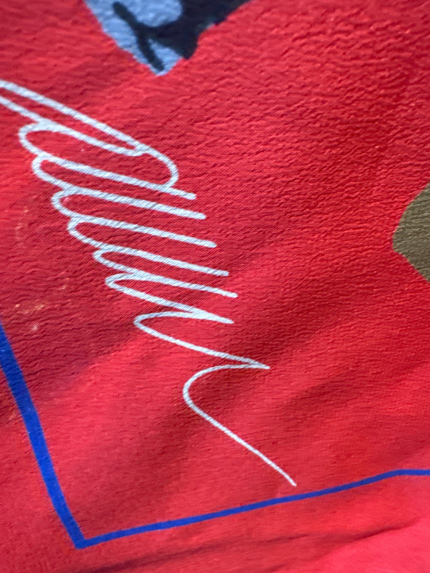 Vintage early 1990s Louis Vuitton red voyage silk scarf. Louis Vuitton “Le Temps d’un Voyage” scarf  is by Italian designer/architect Gae Aulenti, with scattered paint tubes with graffiti-style lettering and hand rolled edges.