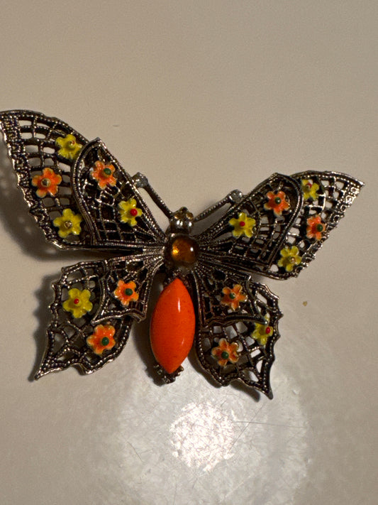ART Arthur Pepper, 1950s brass toned butterfly brooch with mini daisies and yellow and orange