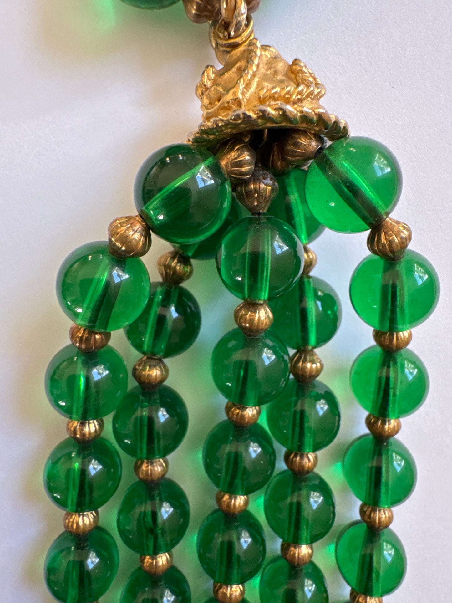 Absolutely stunning signed Kenneth Lane 1970s green glass bead tassel necklace.