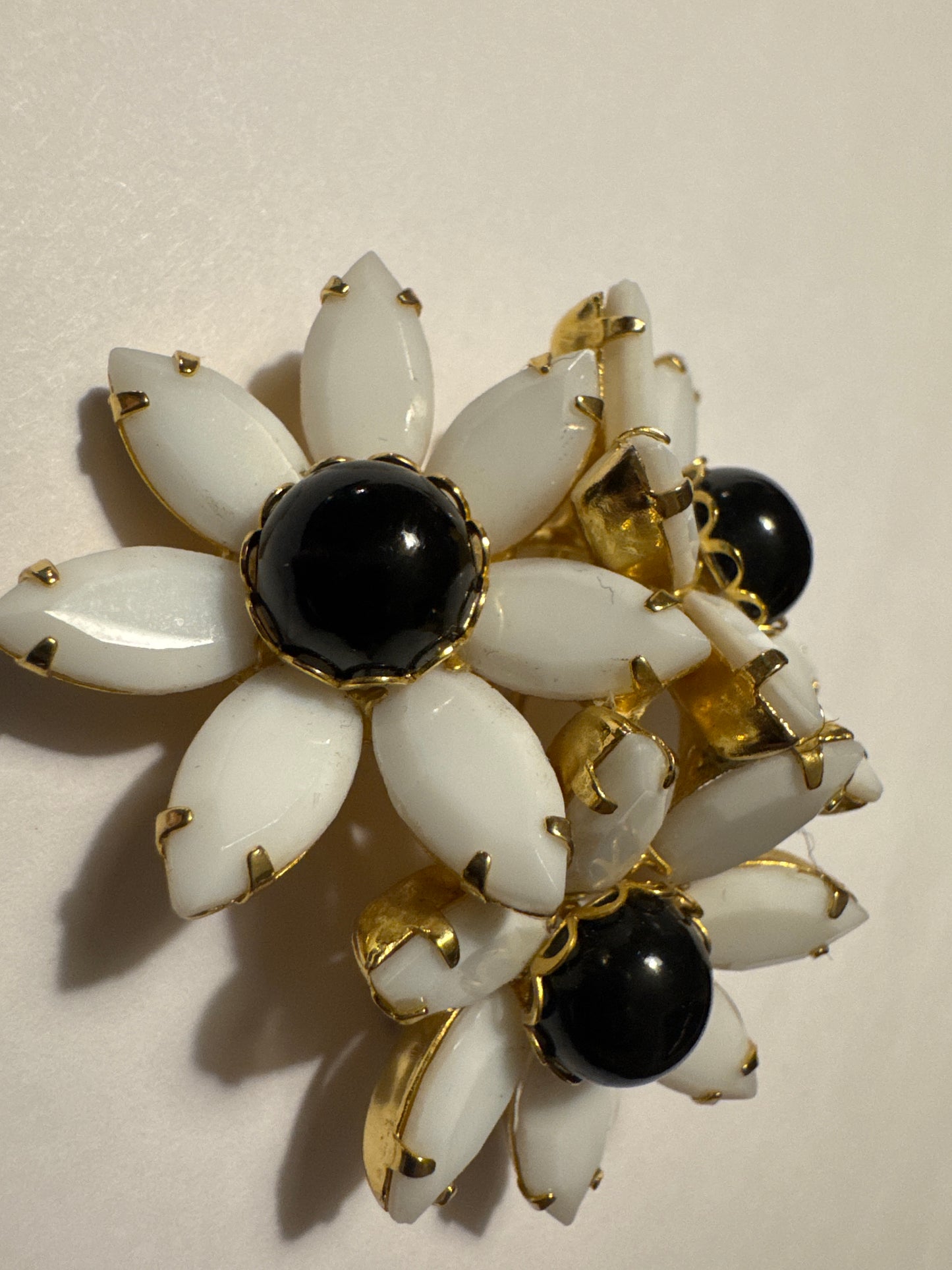 Juliana milk glass navette and black cabochon dome brooch. Road