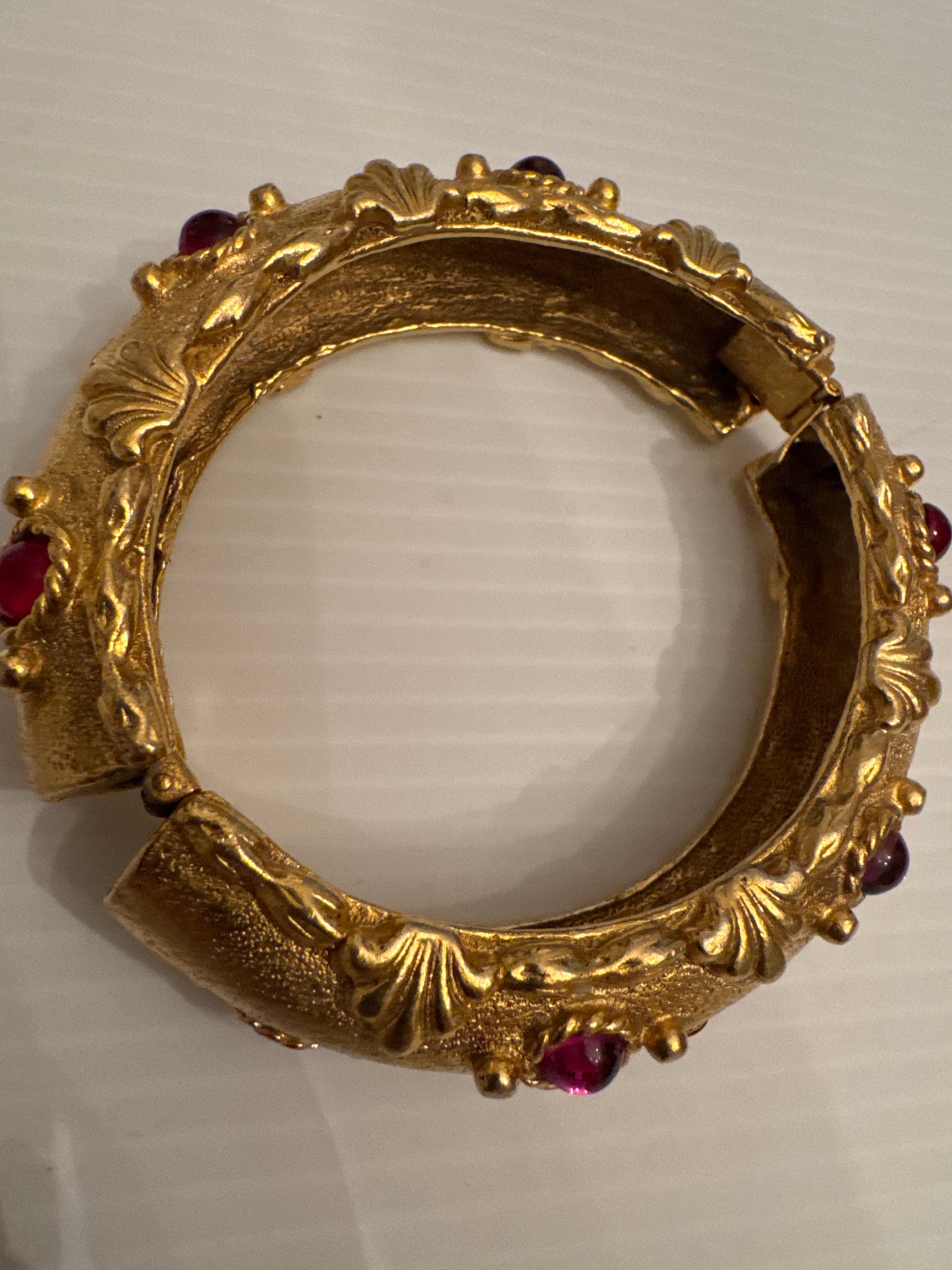 Beautiful vintage signed YOSCA clamper bracelet from 1980s with red pink and purple rhinestones
