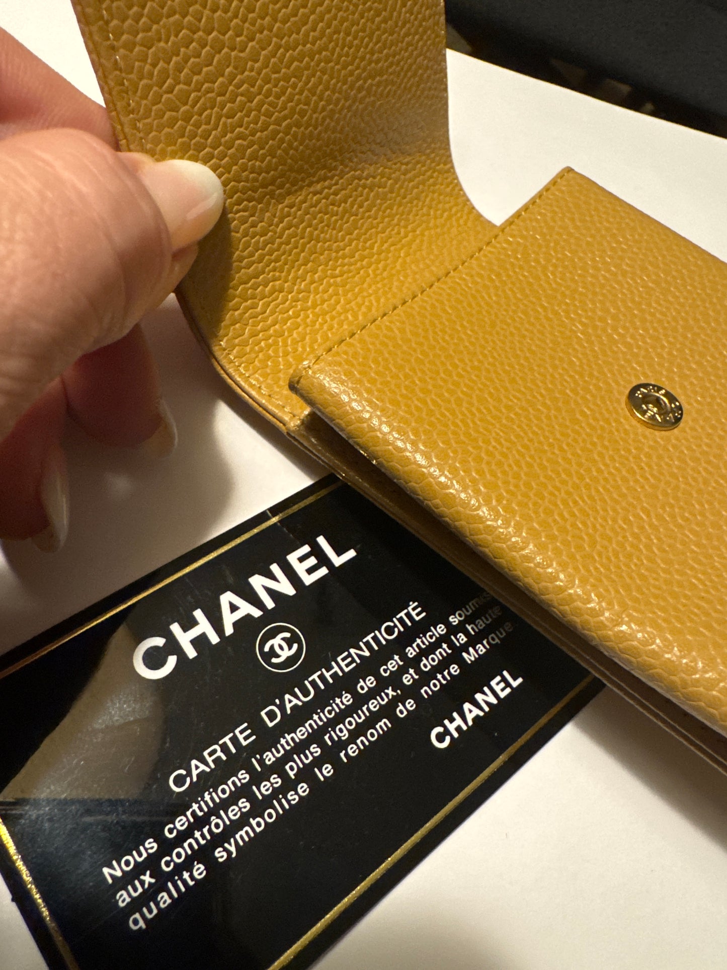 Beautiful tan caviar leather cigarette case, that can also be used for jewelry while traveling or at a chain to where as a cute Crossbody bag. Comes with authentication card.