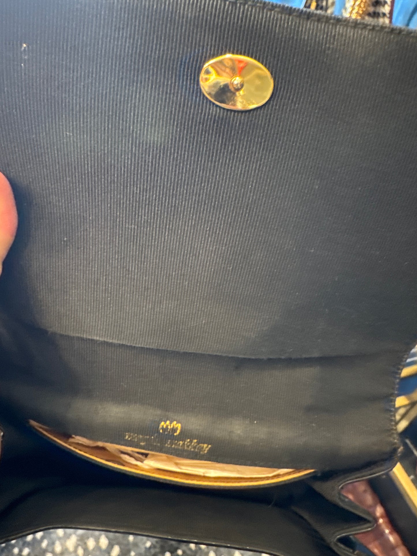 Beautiful 1950s patent leather top handle bag with gold filigree handle. Absolutely stunning