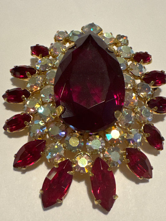 1950s jumbo stunning prong set brooch featuring red navettes and aurora borealis. East Centerstone is absolutely beautiful. Road