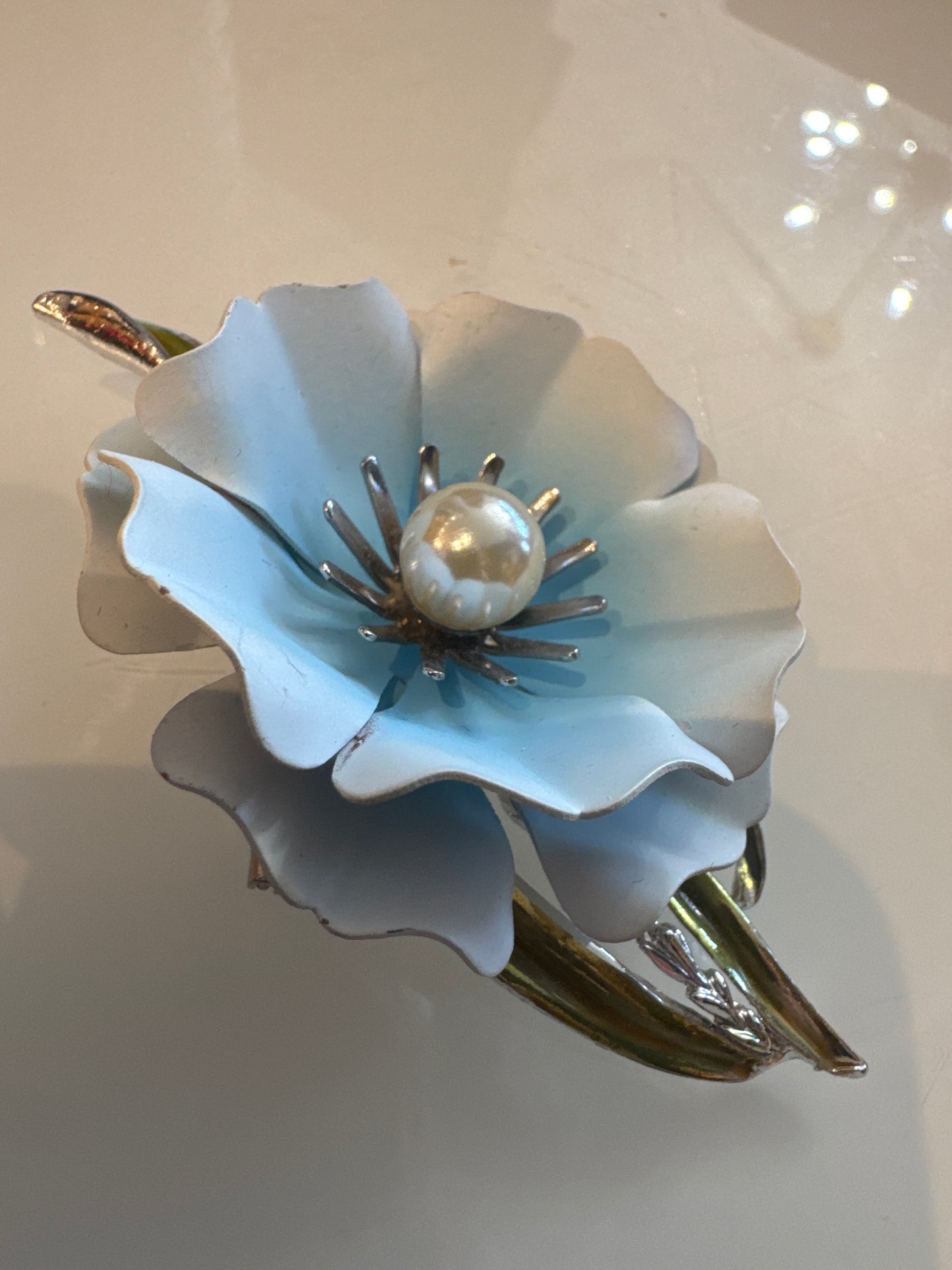 1960s light blue flower brooch with pearl center stone