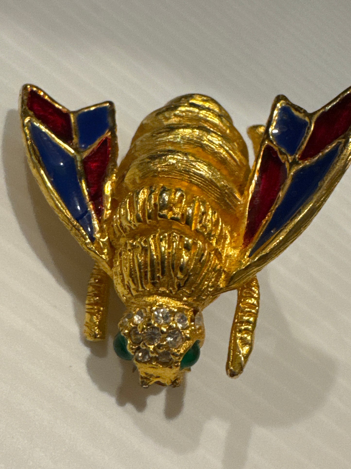 vintage signed KJL insect brooch with enamel and rhinestones