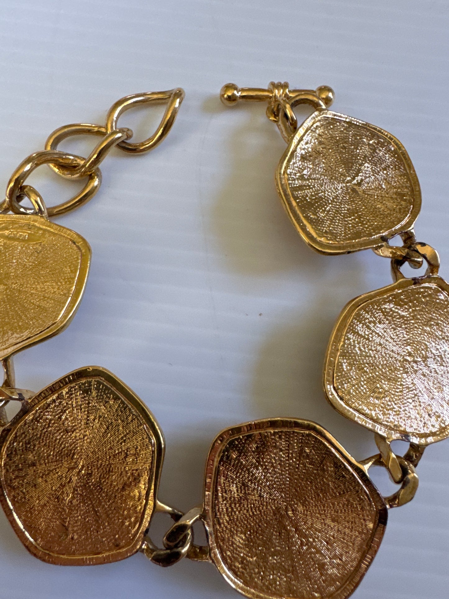Signed vintage Avon colored cabochon gold tone bracelet