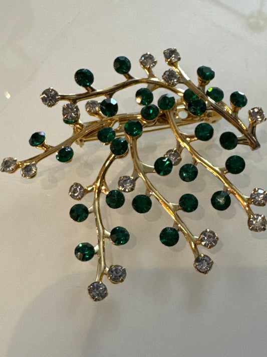 Beautiful unsigned, green and clear rhinestone branch brooch. Stones are super sparkly.