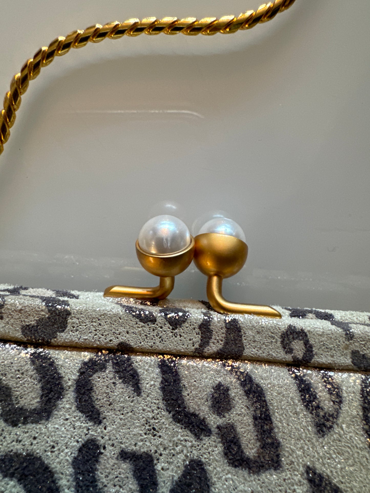 Vintage Judith Leiber leopard printed suede evening bag with pearl closure