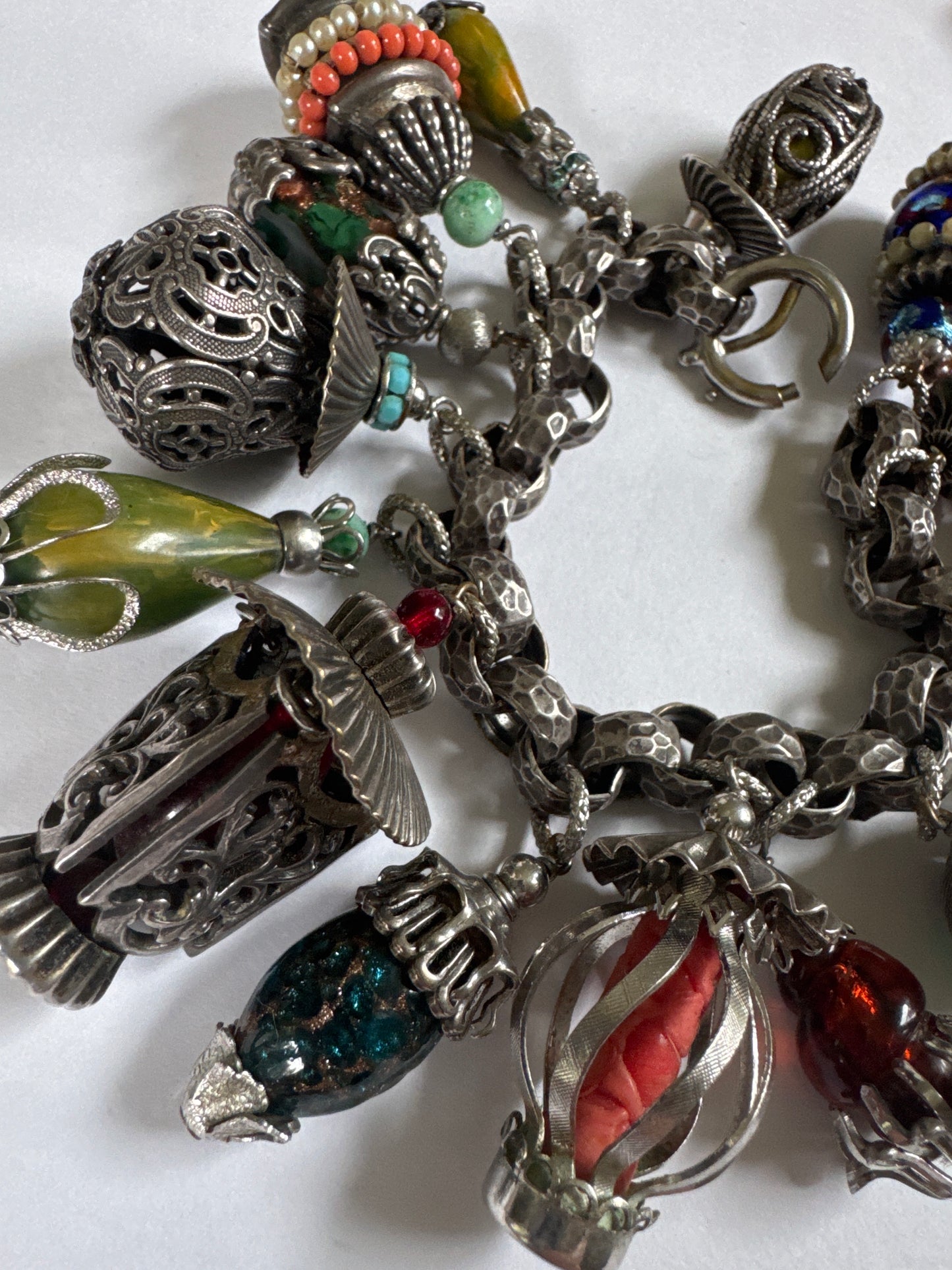 1950s signed NaPIER "latern" charm bracelet by Eugene Bertolli. Book piece on page 309 of The Napier Co.