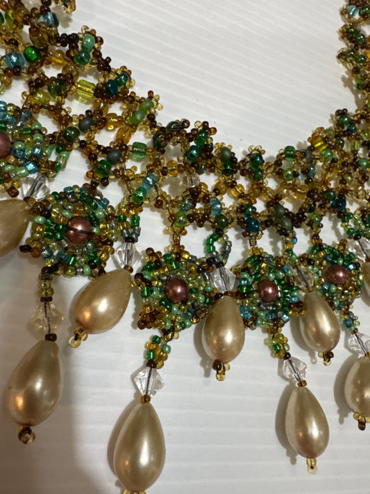 1970s  hand beaded resin and pearl bib necklace. jackpot