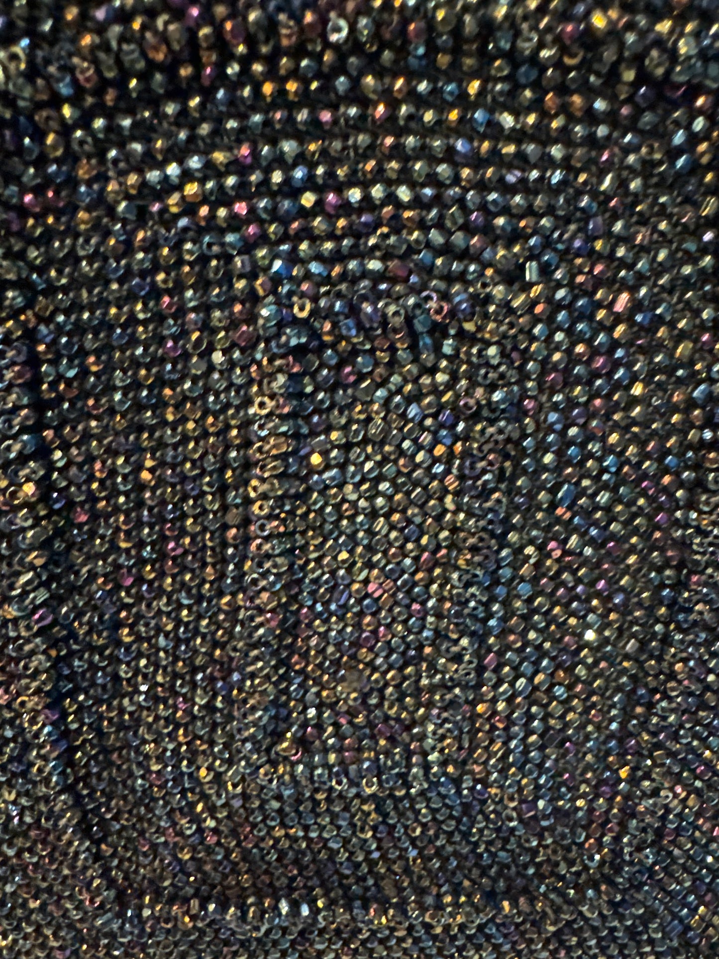 gorgeous 1940s beaded bag with dark green blue and bronze beading. Extra thick handle in mint condition.