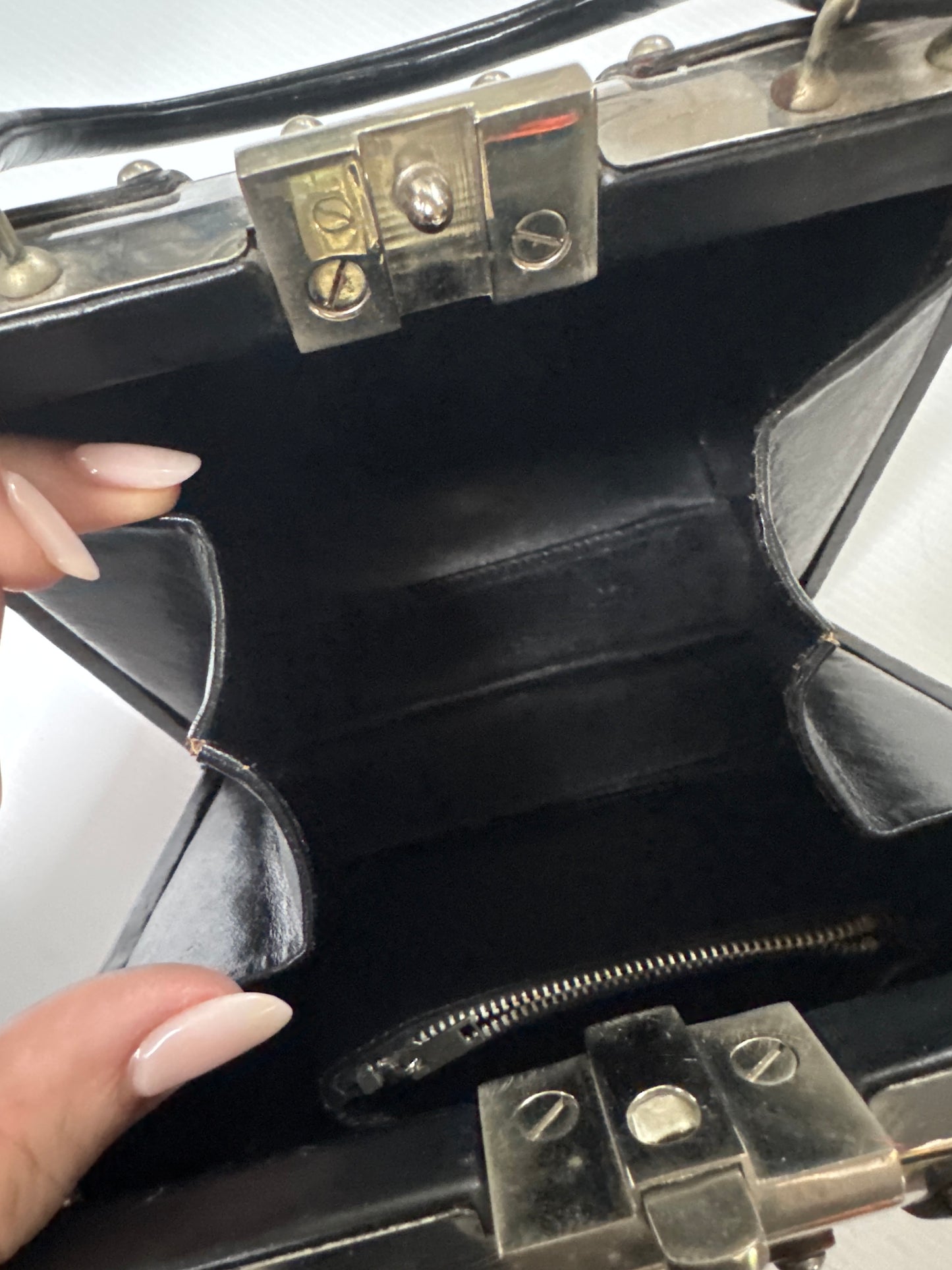 Beautiful 1960s silver, metal and leather top handle bag