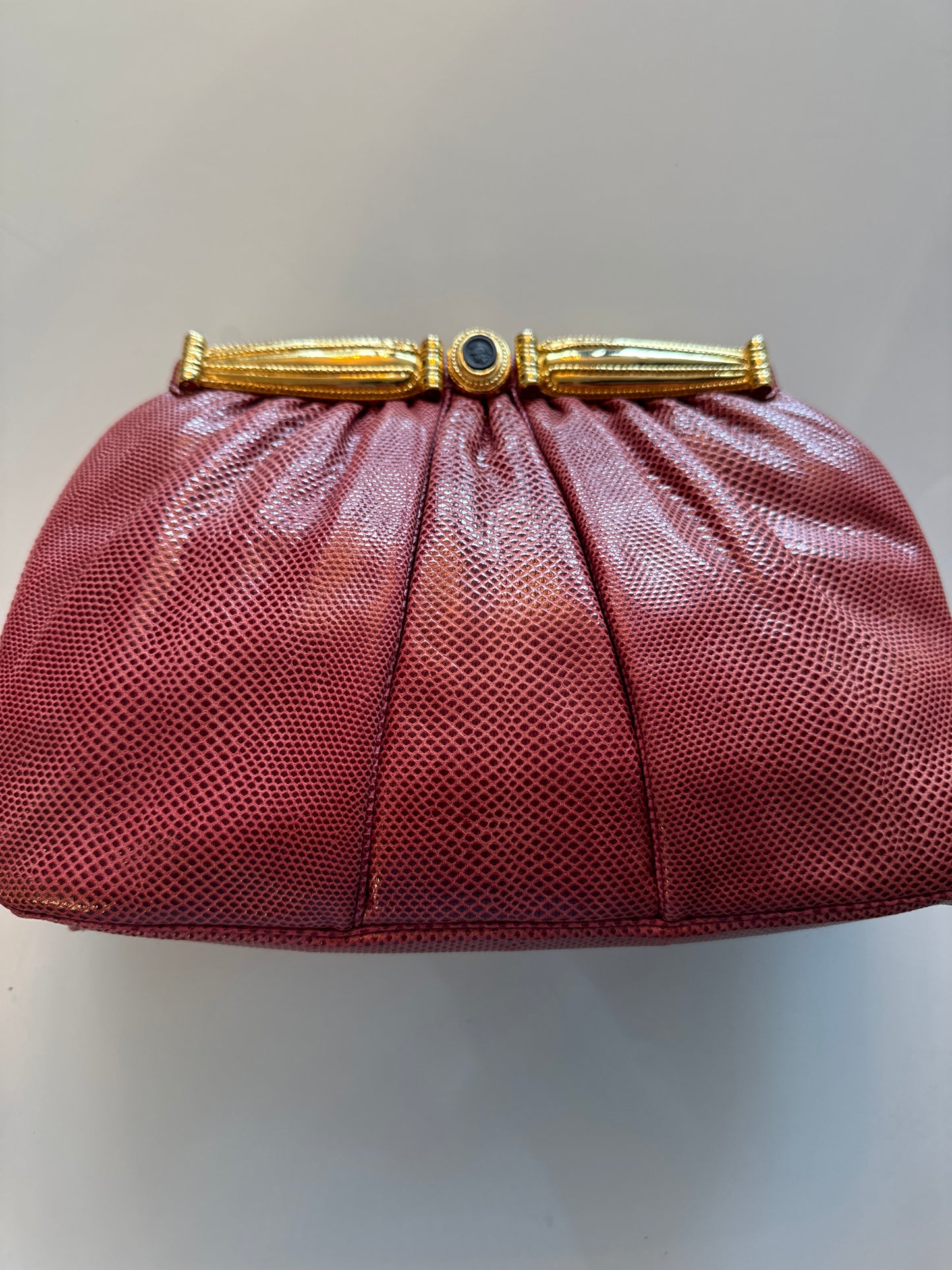 Vintage Terracotta Judith Leiber snakeskins evening bag with shoulder strap and mirror. Comes with dust bag.