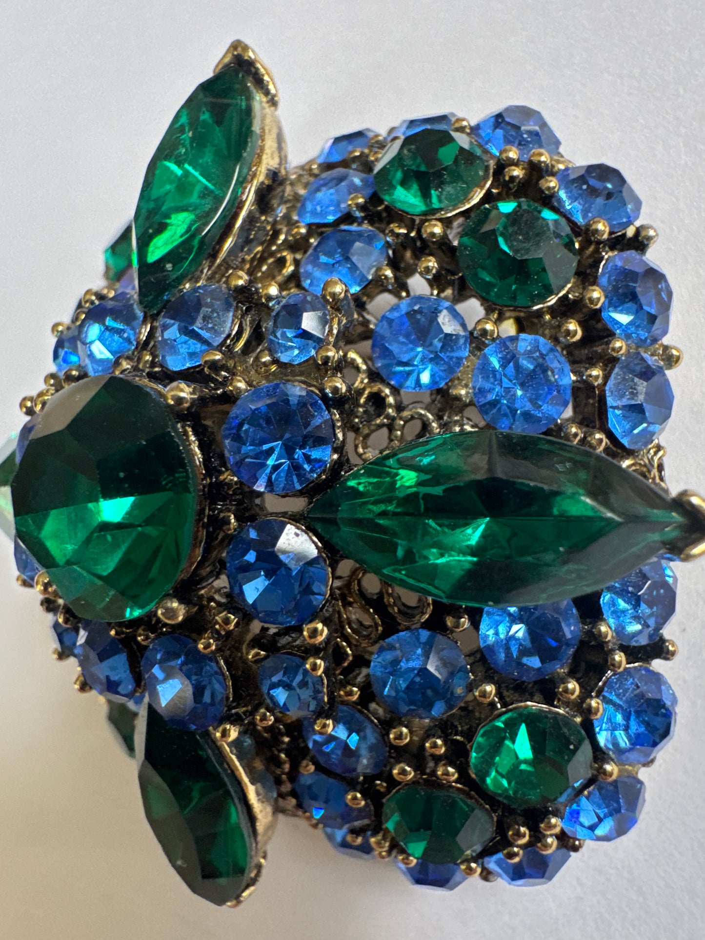 1950s signed Lisner 3 D square brooch with emerald colored and blue sapphire rhinestones