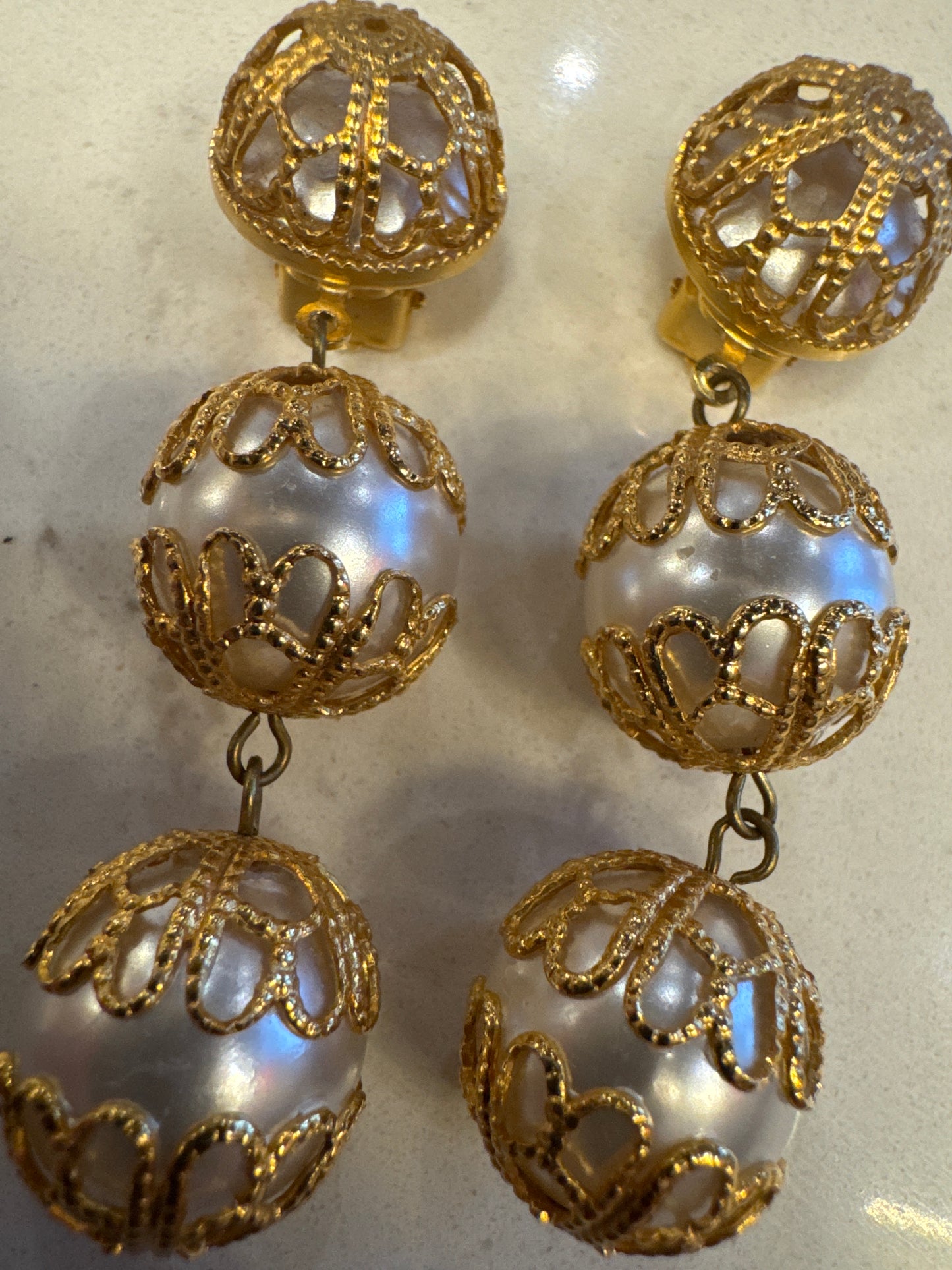 Stunning 1950s pearl and gold tone dangler clip on earrings. NYC