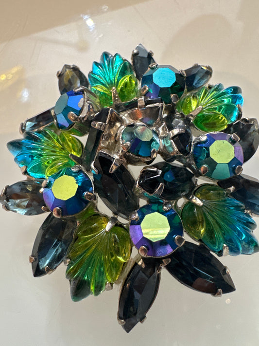 Beautiful green and blue rhinestone brooch with aurora borealis