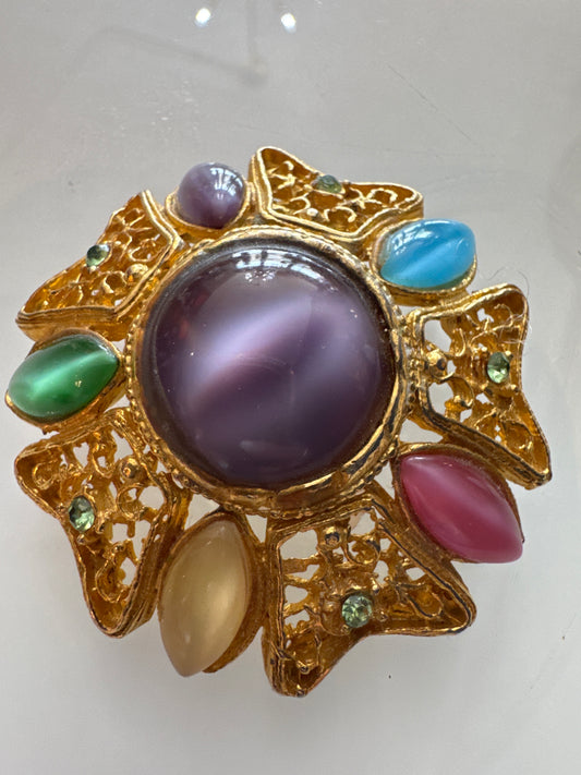 Beautiful vintage gold tone brooch with pastel colored stones and green (uranium) rhinestones