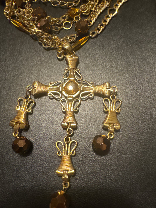 1970s multi strand, signed Scaasi in gold tone with bronze colored beads