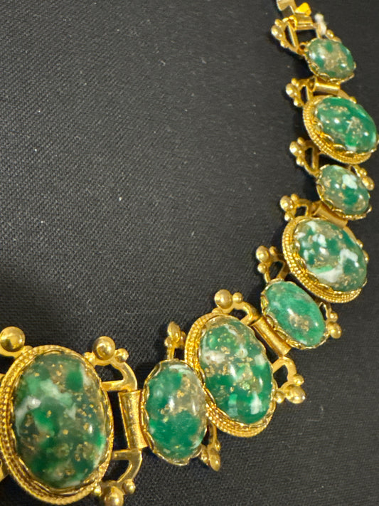 Beautiful 1960s green with gold flex stone bracelet with European mechanical hinges. jackpot