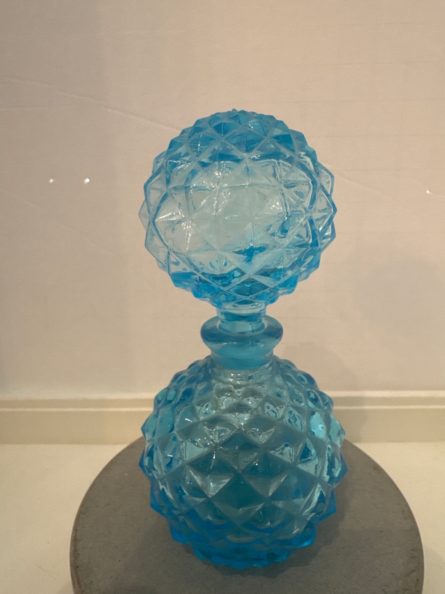 Vintage turquoise glass perfume bottle