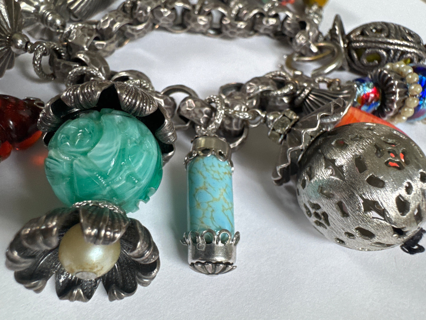 1950s signed NaPIER "latern" charm bracelet by Eugene Bertolli. Book piece on page 309 of The Napier Co.