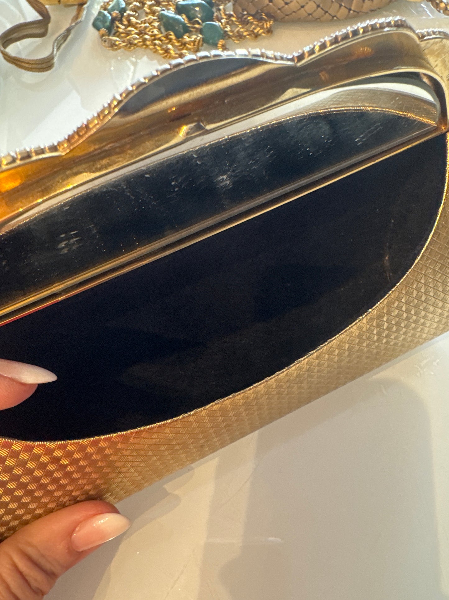 Beautiful vintage 1950s gold hardshell clutch with rhinestone detail, and mirror inside