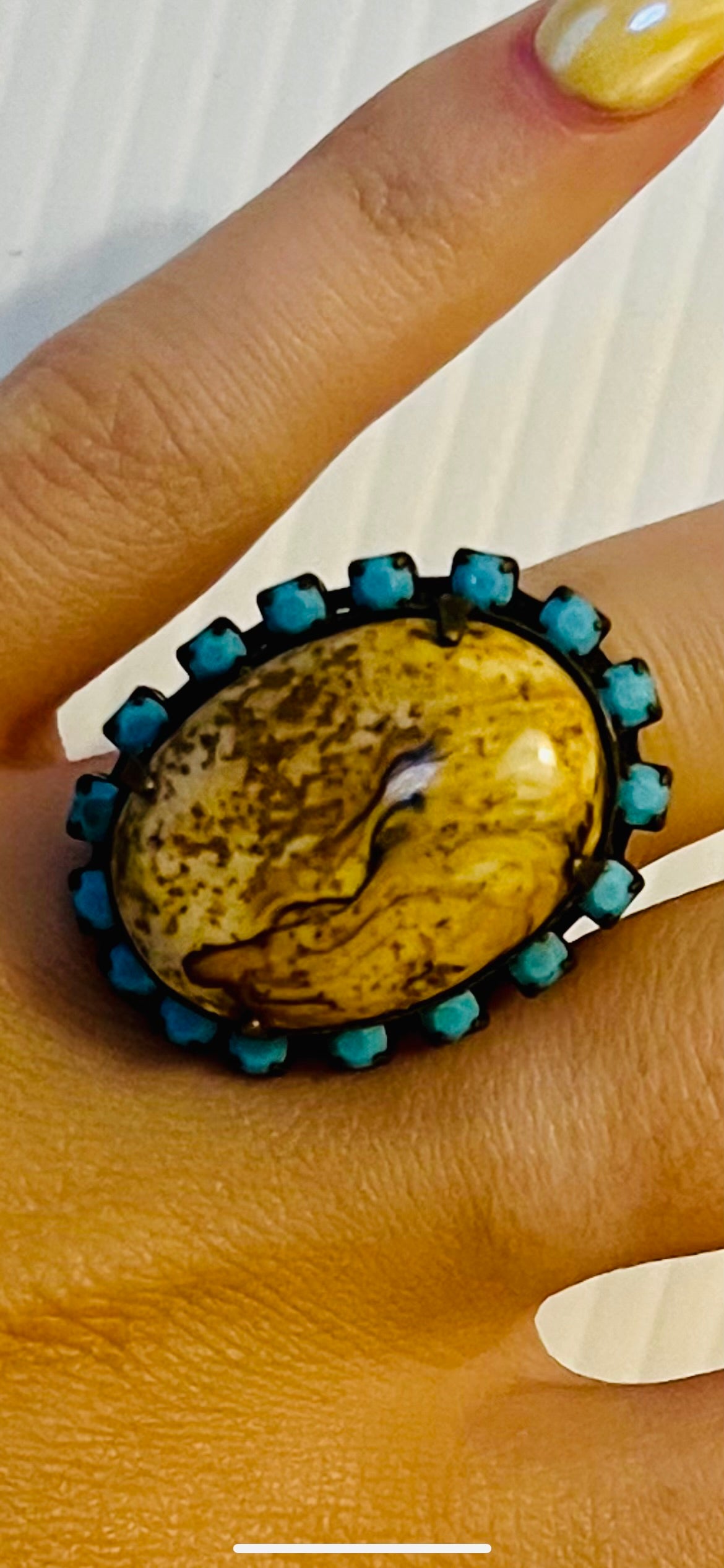 Vintage brass tone ring with turquoise rhinestones and large tan stone