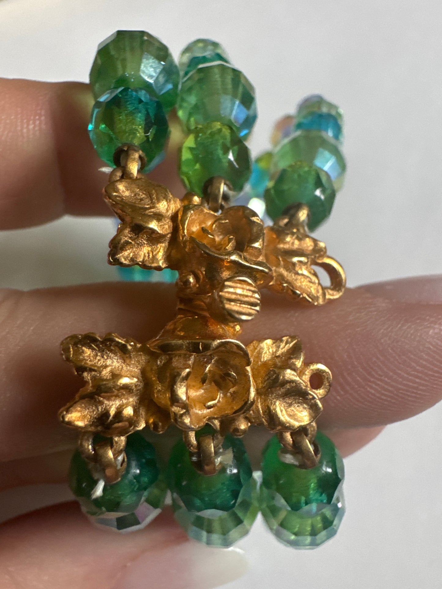 Unsigned attributed to Schiaparelli crystal bracelet with green and blue beads. Clasp points us in the direction of Schiaparelli along with the gradation of colors used.