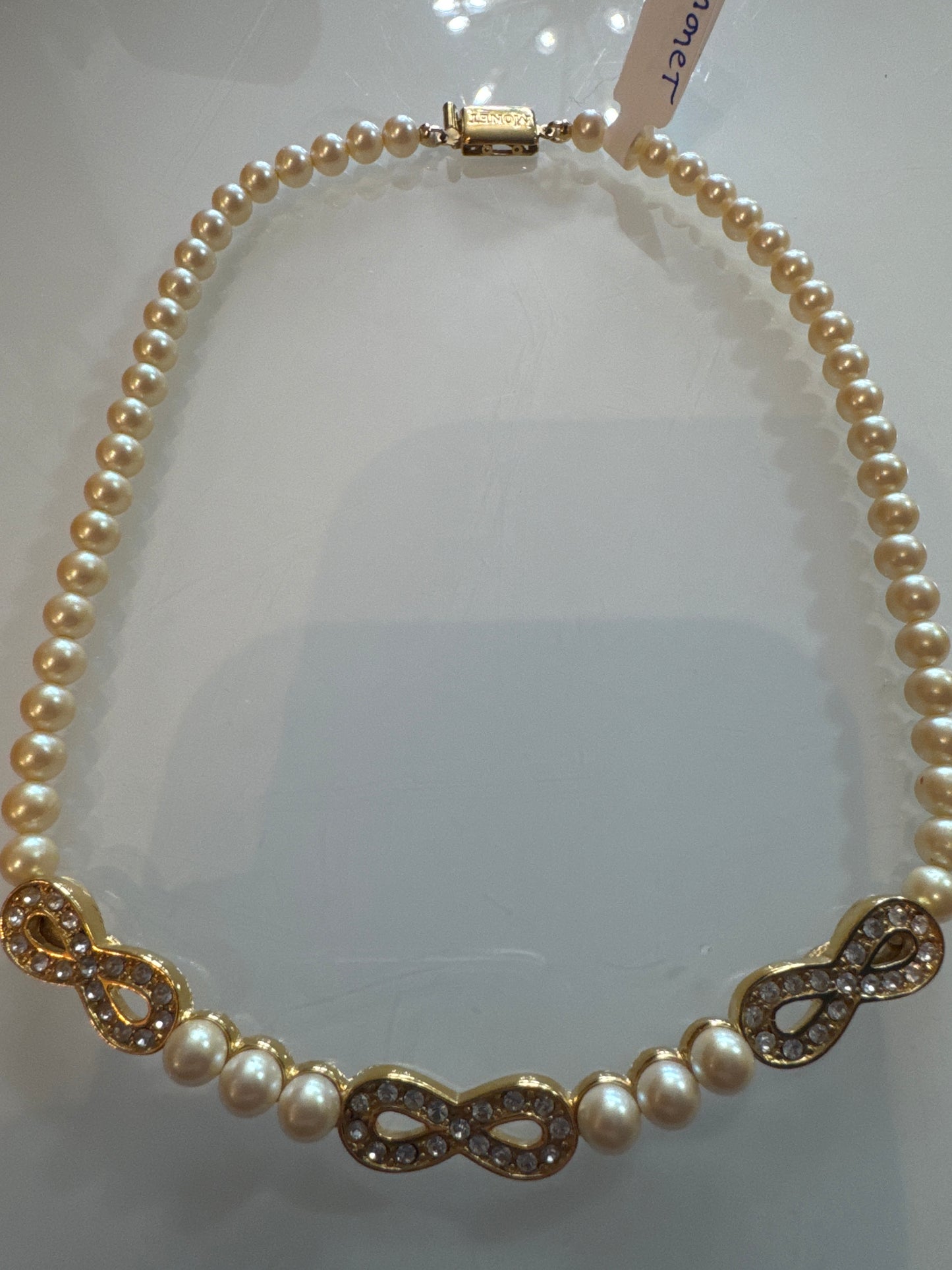 Vintage early 2000s MONET pearl and gold tone infinity necklace