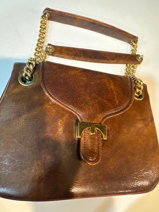 fabulous 1960s brown vinyl triple compartment handbag with chains and decorative closure